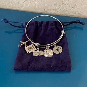 Silver travel themed bangle bracelet